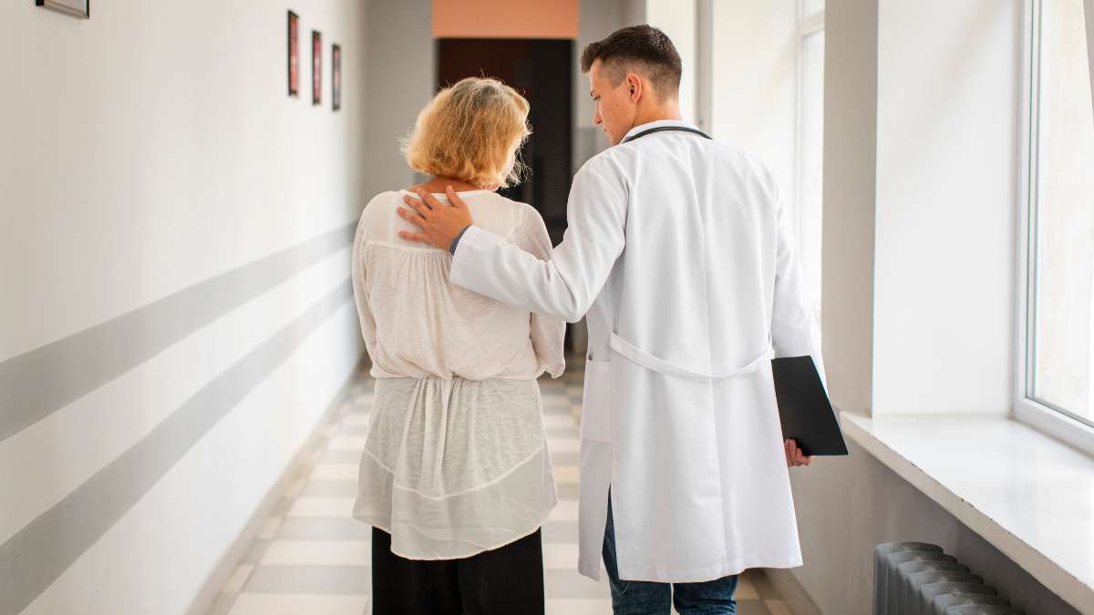Doctor supporting patient on her journey to recovery 