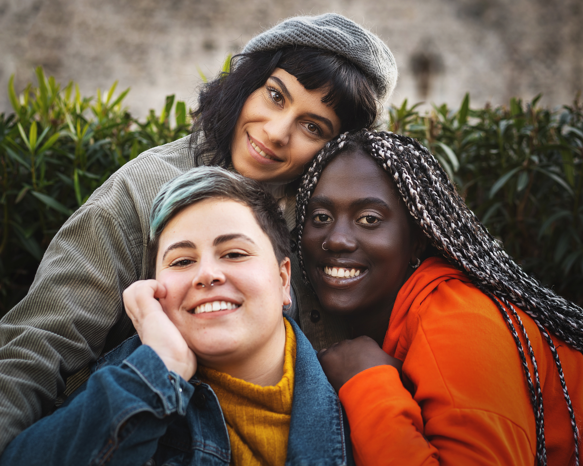 Portrait of multiracial diverse young woman smiling and looking at the camera Portrait of multiracial diverse young woman smiling and looking at the camera